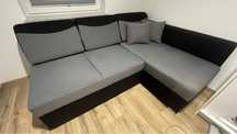 Narożnik sofa z funkcją spania + 2 pufy