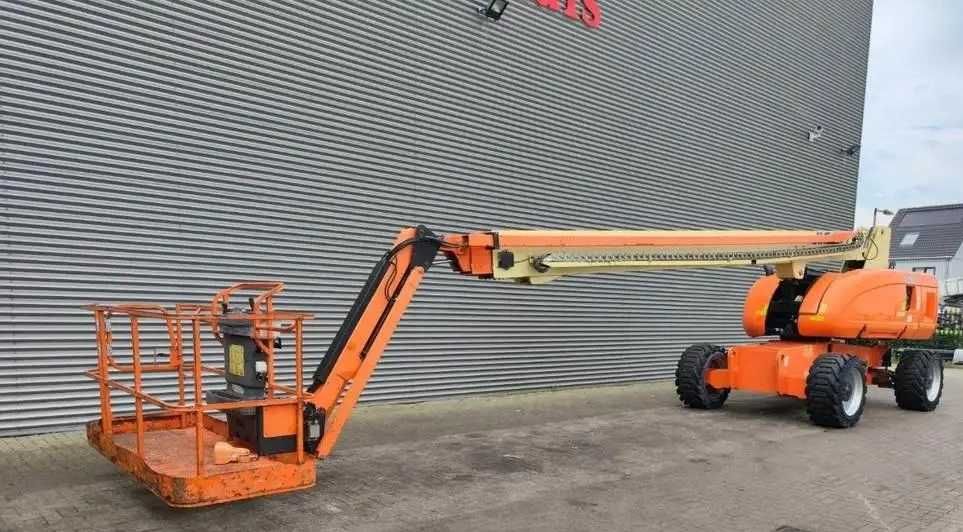 JLG 860 podnośnik teleskopowy 28 m wys robocza Genie S-85