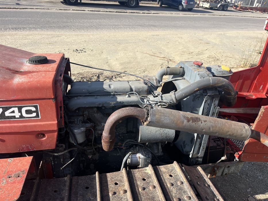 Trator rastos mf 174c usado