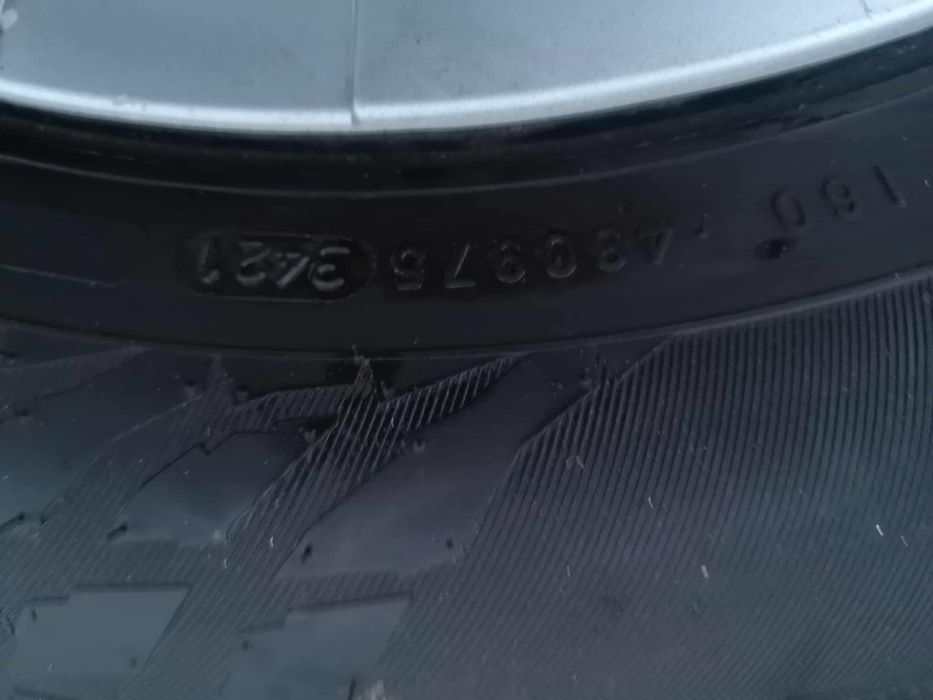 Koła toyota Auris czujniki 195/65/15 opony zimowe Nokian kołpaki tpms