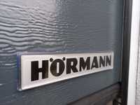 Гаражные секционные ворота "Хьорманн". От официального дилера.