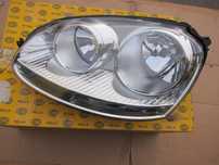 Фара Volkswagen Golf Jetta Гольф 5 V HELLA 1EG247007571