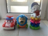 Игрушка каталка пирамидка уточка
