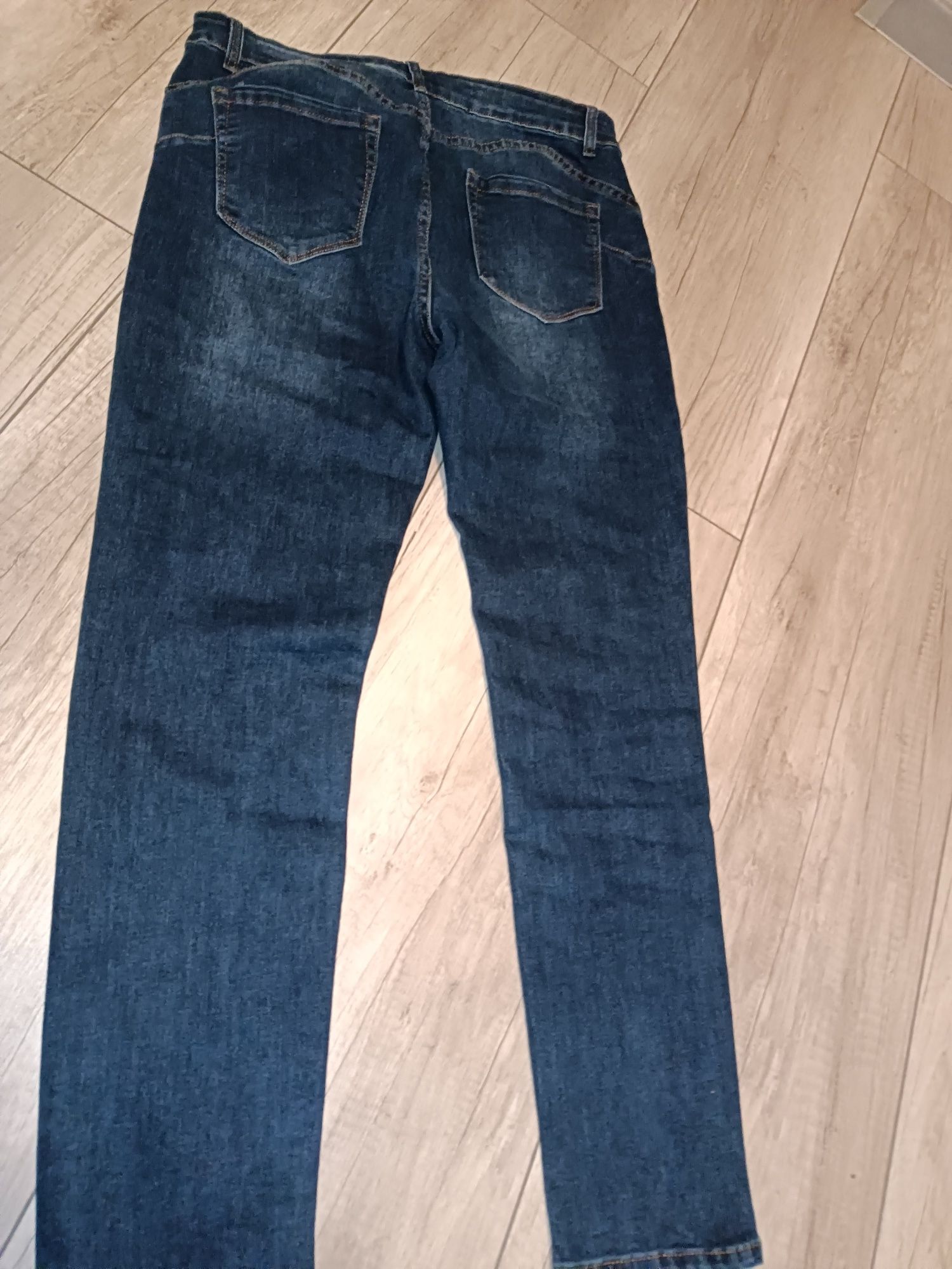 NOWE Spodnie jeans  rozmiar 46.