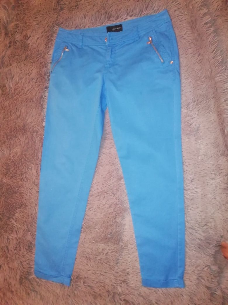 Reserved niebieskie spodnie z zamkami r. 36