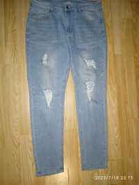 Spodnie męskie, jasne jeansy z dziurami firmy Shein rozmiar M, stan bd