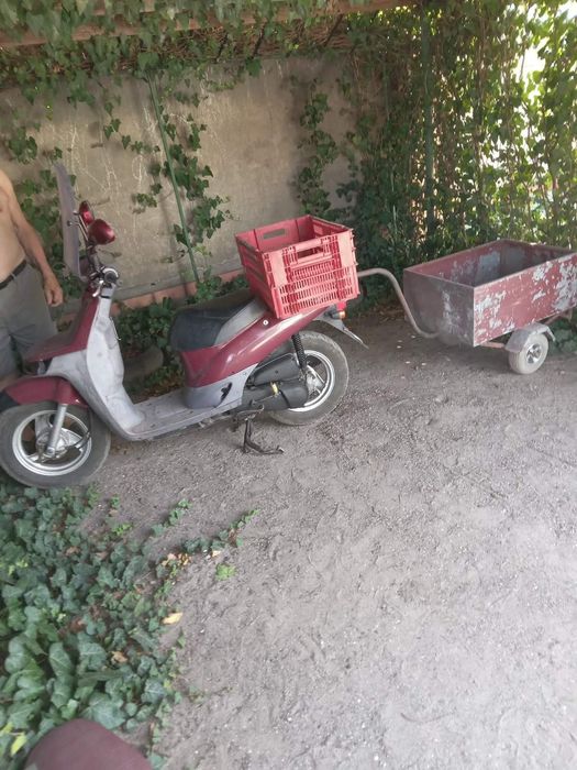 Продам скутер Ноnda  Topik, на ходу. С прицепом