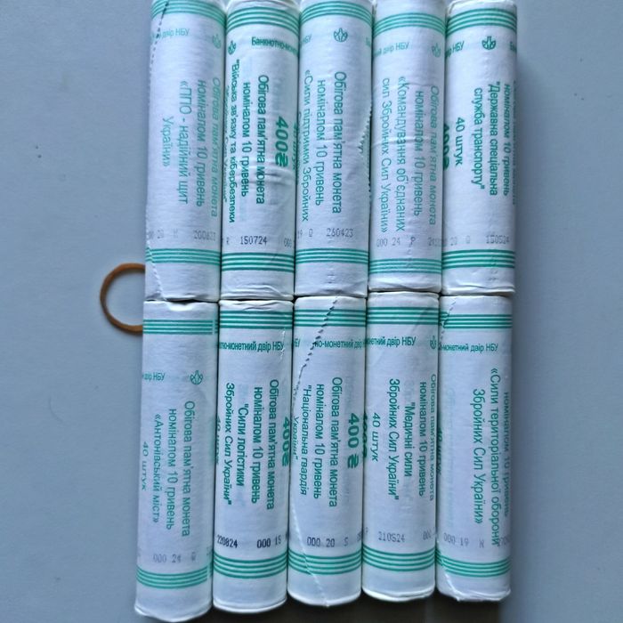 Памятні монети по 10 гривен в ролах і по штучно