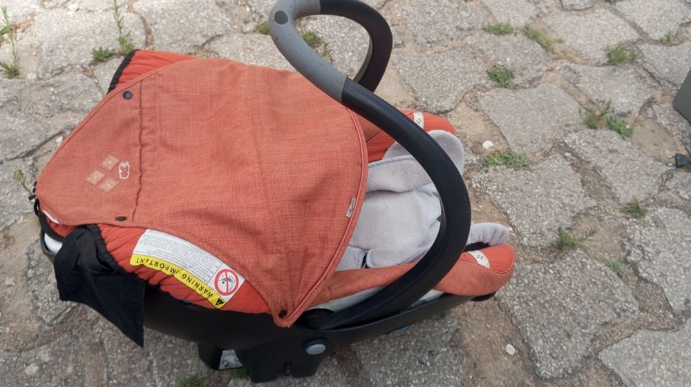 Cadeira ovinho de bebé com sistema de segurança para o carro