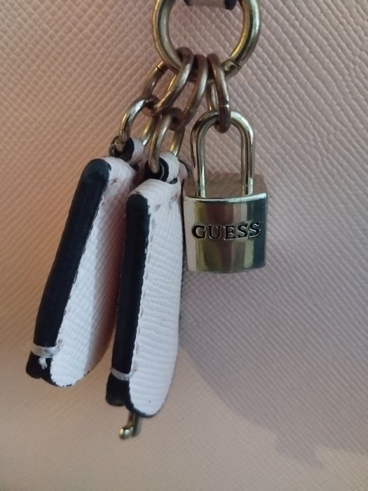 Mala Guess rosa claro