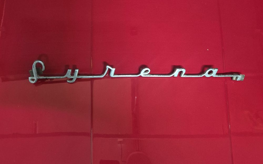 Napis Emblemat  Syrena