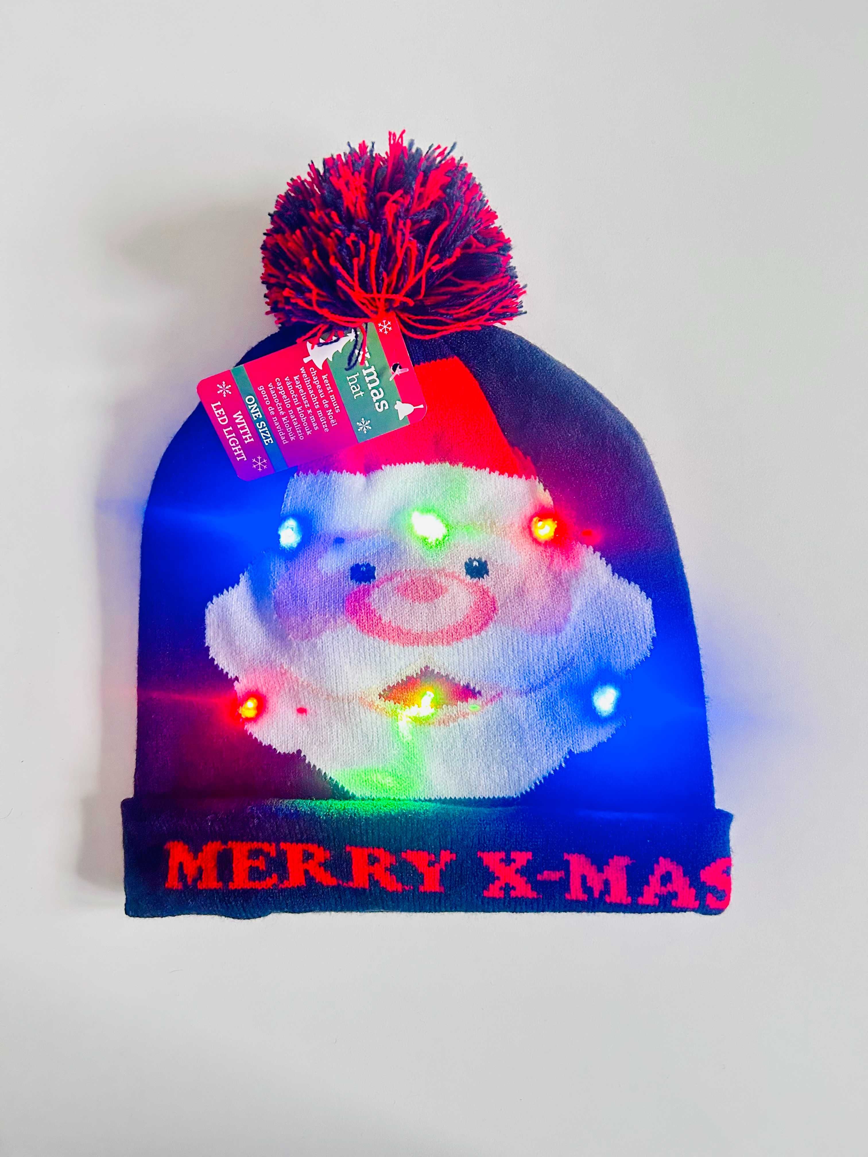 Czapka świąteczna LED z Mikołajem / Czapka z Mikołajem LED Merry X-Mas