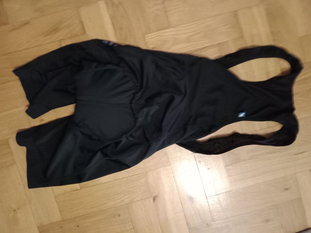 Jak nowe.Spodnie rowerowe,kolarskie z szelkami rozm z metki  M