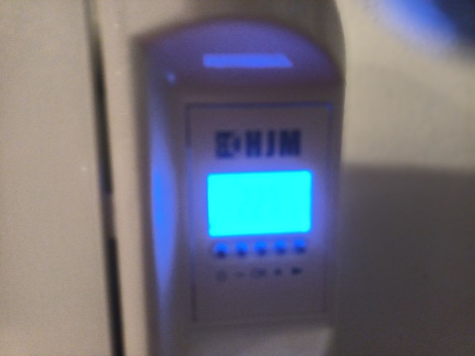 Aquecedor de parede a óleo eléctrico.