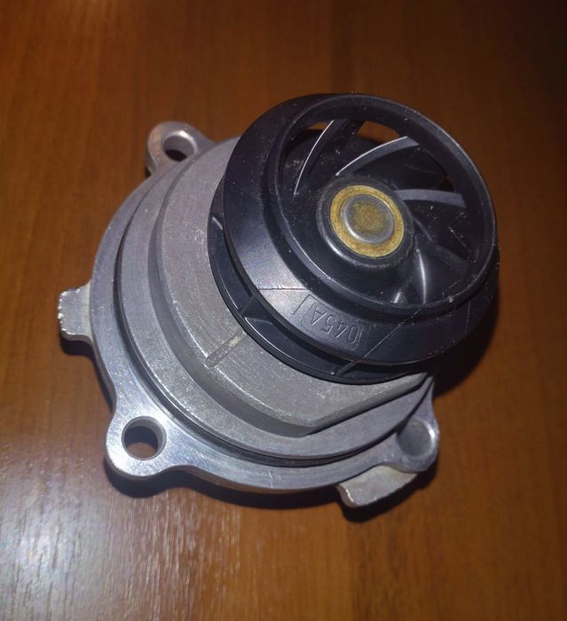 Помпа насос охолодження 1.6 MPi BSE VAG 06A121031C 06B121011Q оригінал