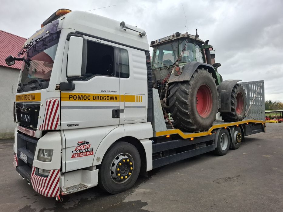 Transport maszyn rolniczych i budowlanych, pomoc drogowa, holowanie