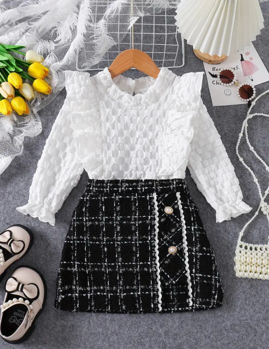 Новий костюм для дівчинки