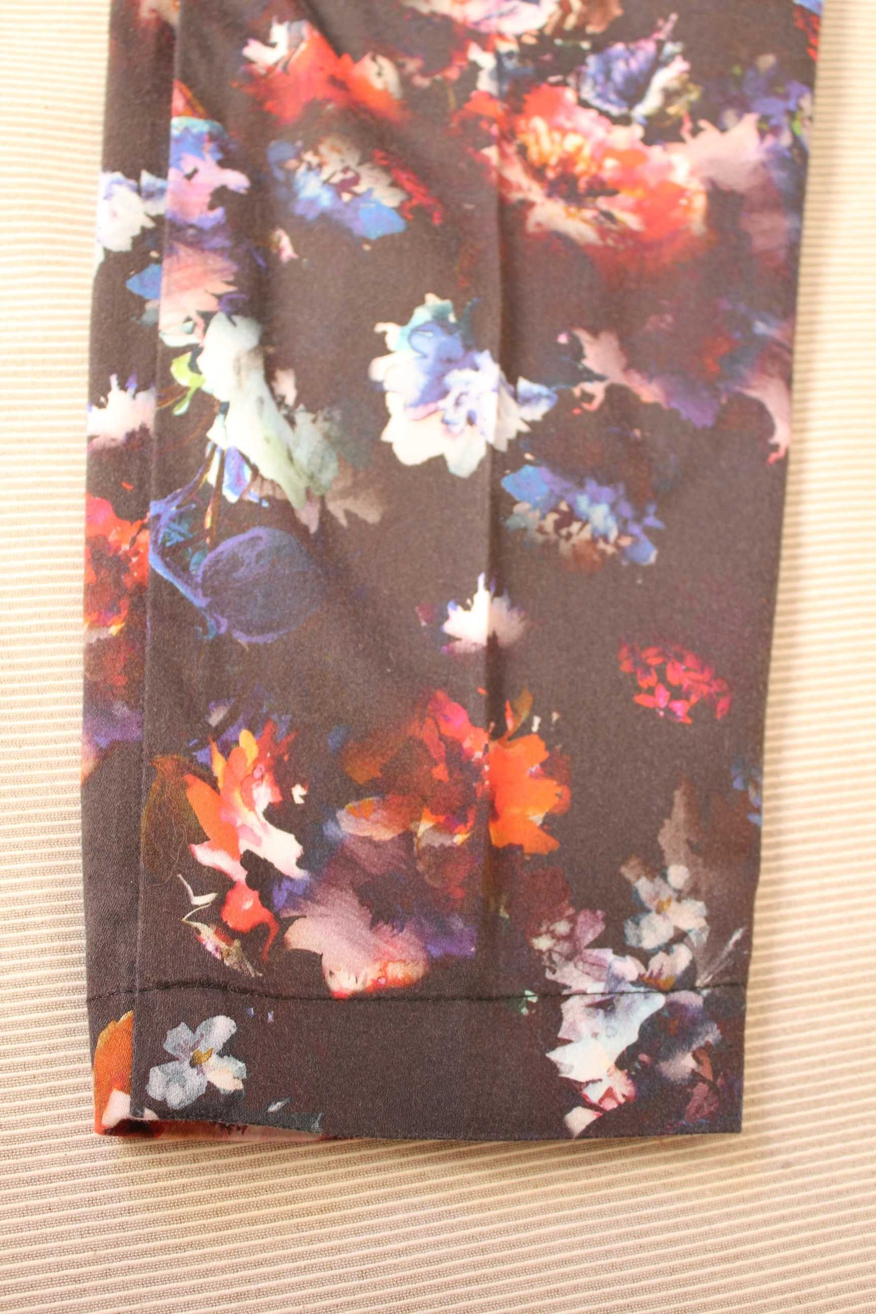 Eleganckie spodnie w kwiaty ORSAY rozm.40
