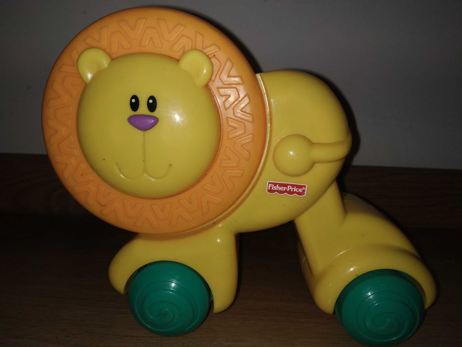 Lew fisher price naciśnij i jedź