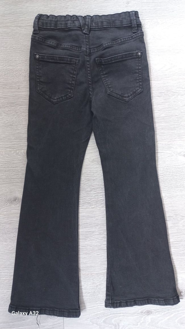 Reserved Spodnie jeansowe 122 flare rozszerzane dzwony rozcięcie jeans