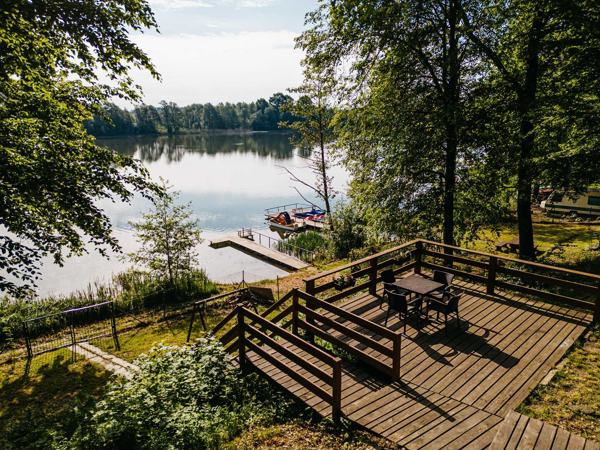 Domek na Mazurach Domki nad jeziorem Pozorty enklawaUrocza Przystań