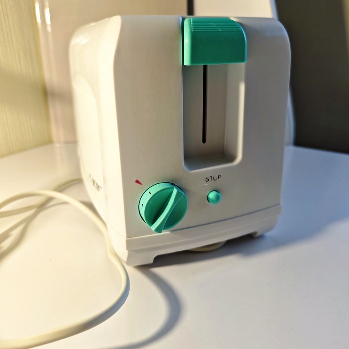 Продам тостер rising