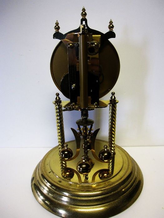 antigo Relógio anual de pêndulo rotativo KUNDO com redoma