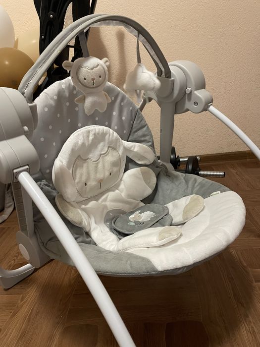 Дитяче крісло-гойдалка, заколисуючий центр