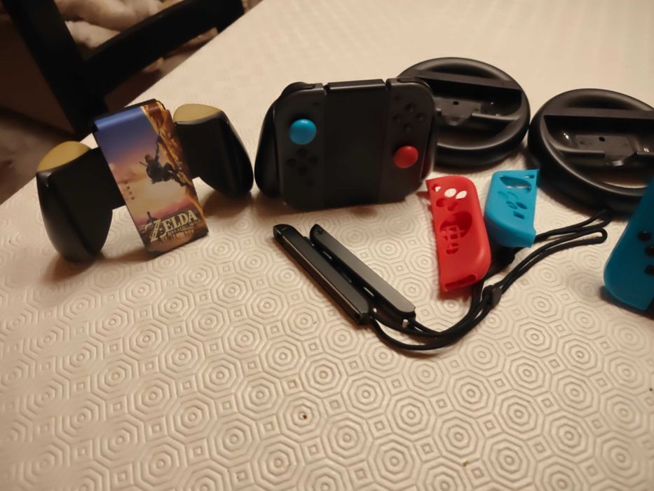 Nintendo Switch Consola + Caixa + Bolsa + Grip + Jogos