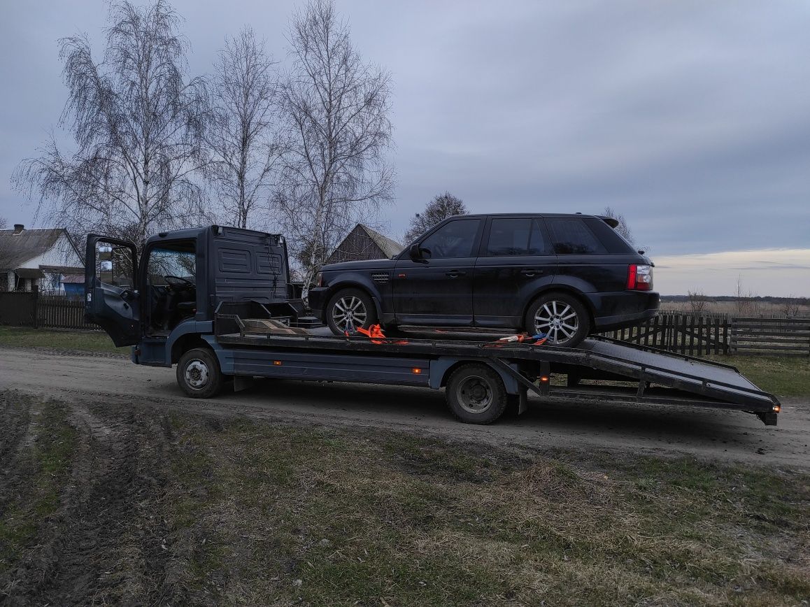 Евакуатор Перевезення авто, тракторів і спецтехніки евакуатор Бобкат