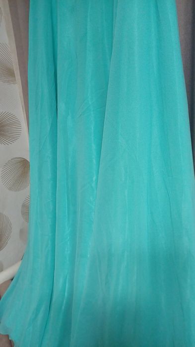 Вечірня сукня.В ідеальному стані.Одягала один раз розмір 50-52