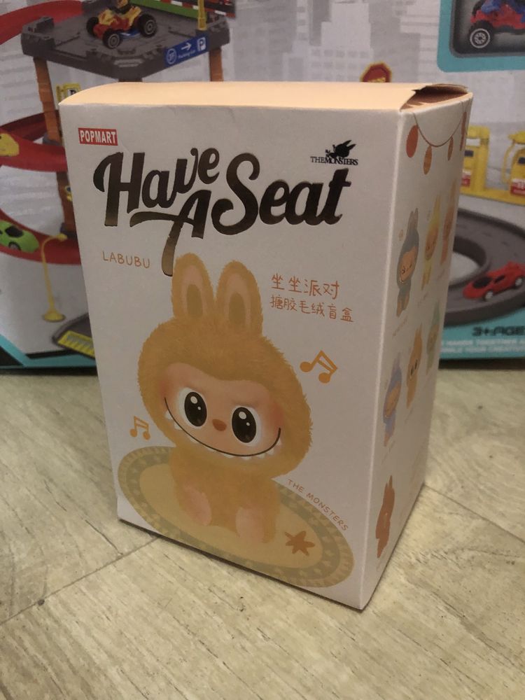 Лабуба have a seat