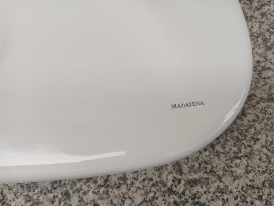 Tampa de autocolismo em louça