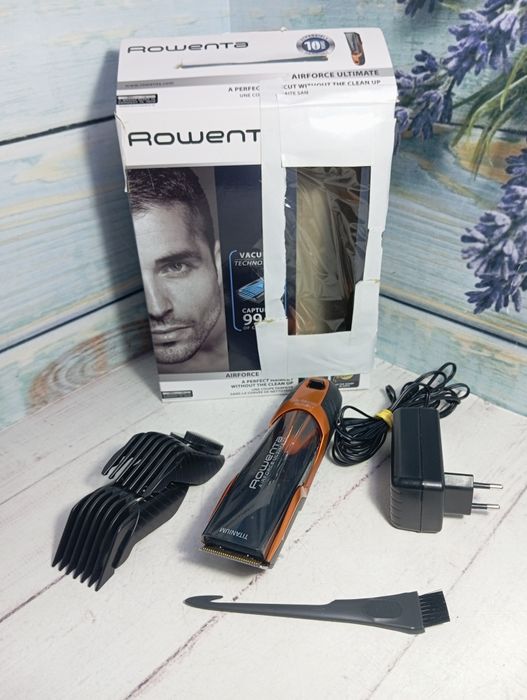 Машинка для стрижки Rowenta с пылесосом