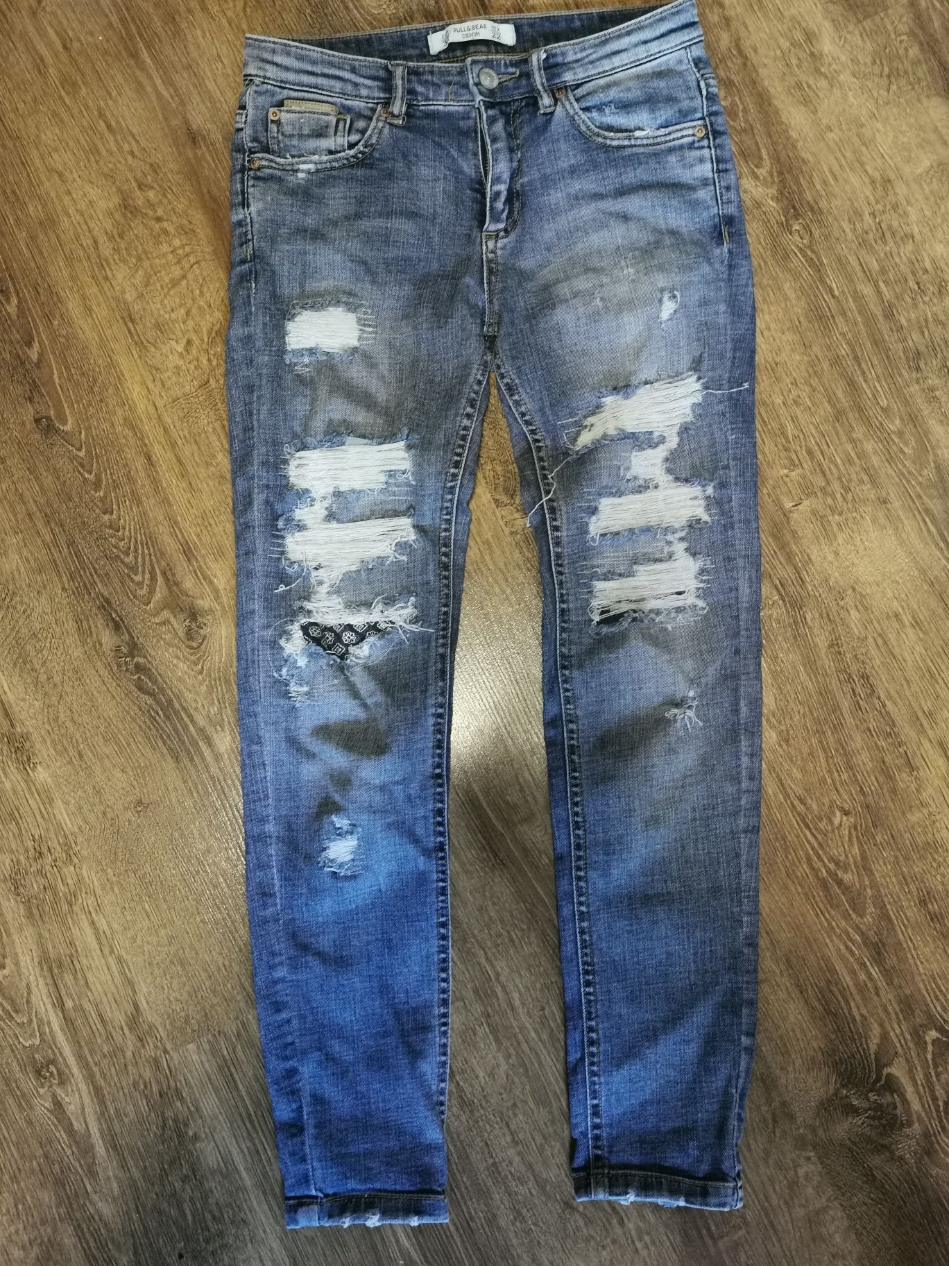 Spodnie jeansowe rurki rozszerzane dziury 32 /34 xs dzinsy