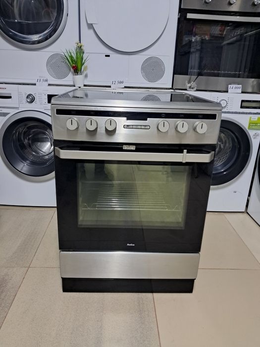 Широка електрична плита Аmica з  духовою шафою на 65л та шириною 60 см