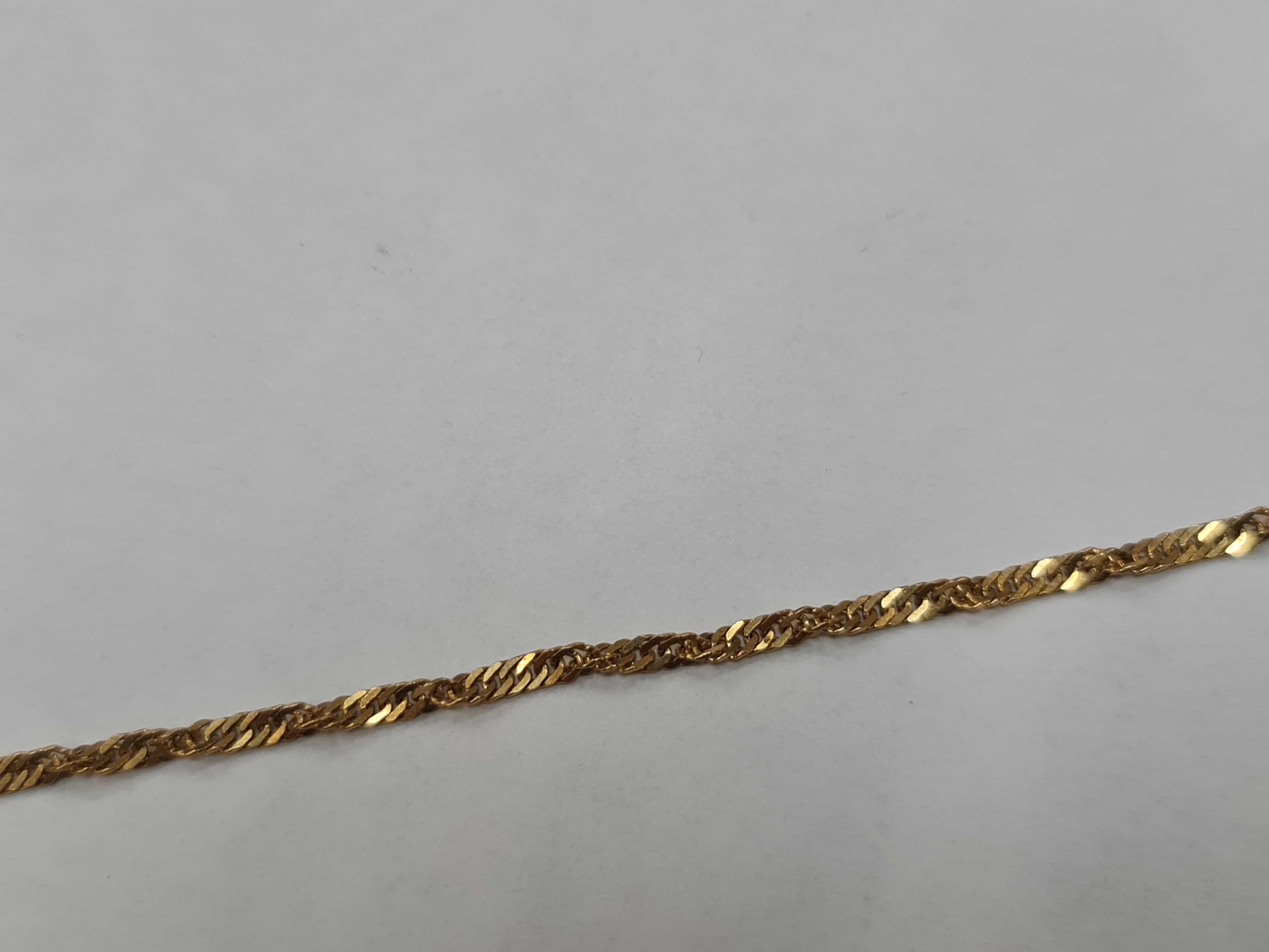 Złota bransoletka damska/ 585/ 2.40 gram/ 19.5 cm/ Singapur