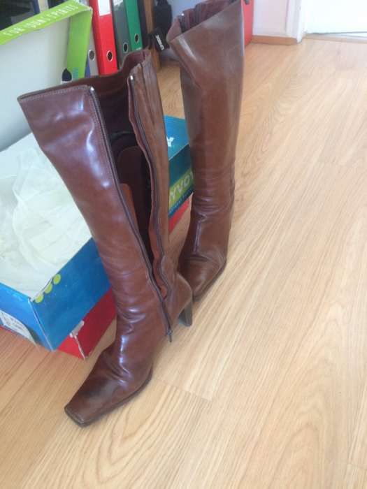 Botas altas pele