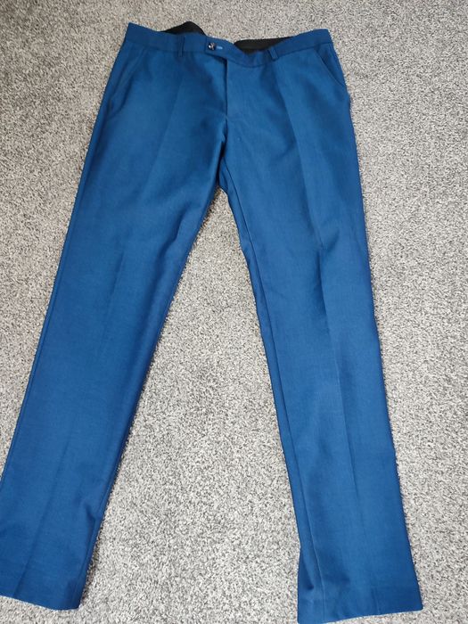 Garnitur młodzieżowy 60 % wełna granatowy męski XL/ L na 180 cm