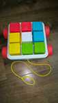 Іграшка-каталка Fisher Price Яскраві кубики