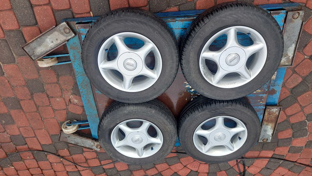 Komplet kół 4x100 5,5J13 Et 38 Fi 64 +Continental 175/70/13 KPL K 7