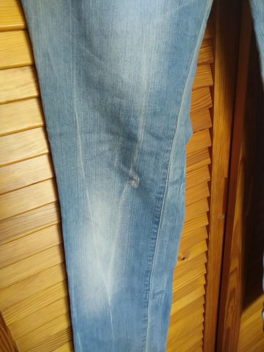 Jeansy damskie Reserved