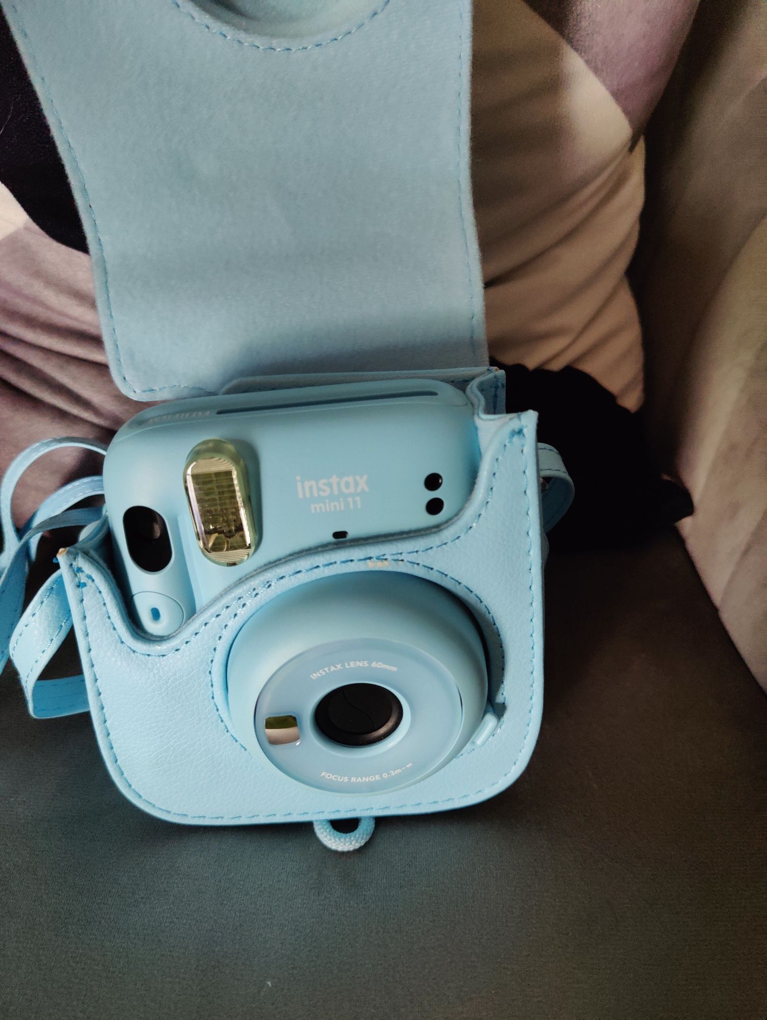 Máquina fotográfica instax