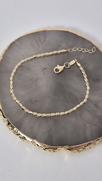 Nowa złota bransoletka, ruchoma, nietypowy splot,sztywna, 585