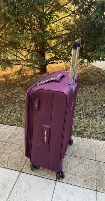 Чемодан дорожный на четыре колеса валіза на амортизаторах Three Birds