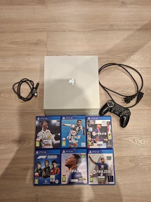 PlayStation 4 Pro 1TB White + pad + gry FIFA & F1