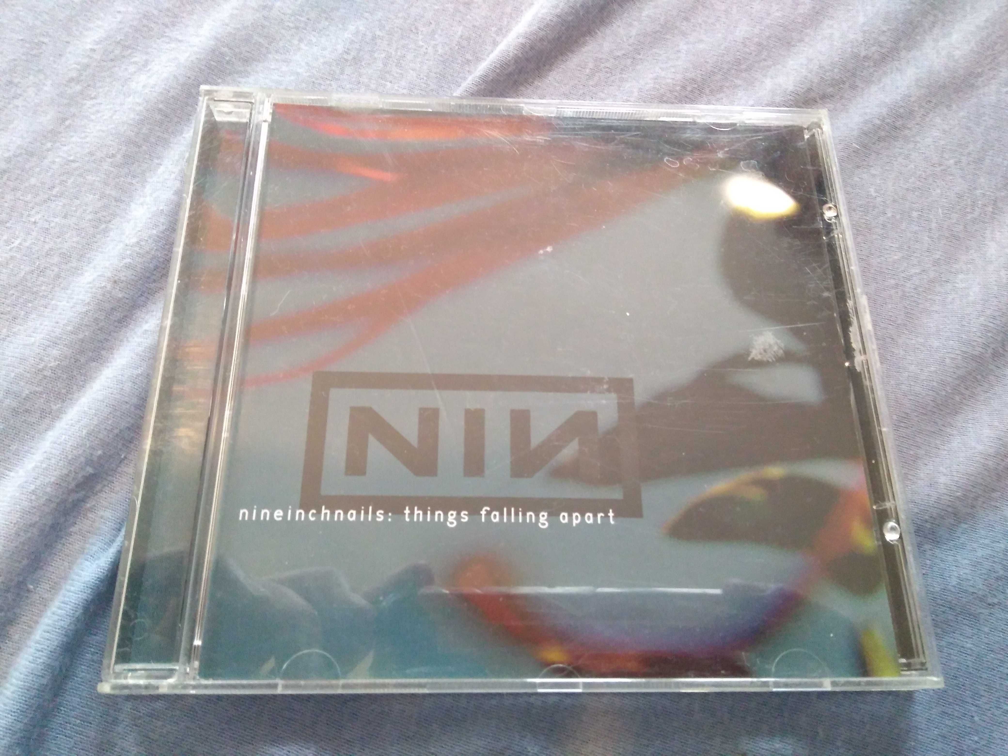 Nine Inch Nails „things falling apart” plyta CD