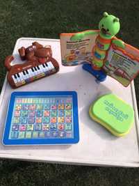 Дитячі іграшки на батарейках ноутбук, піаніно, планшет, співоча книга.