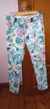 Materiałowe kolorowe spodnie w kwiaty 38 bawełniane