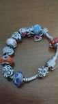 Pulseira Pandora com 12 contas